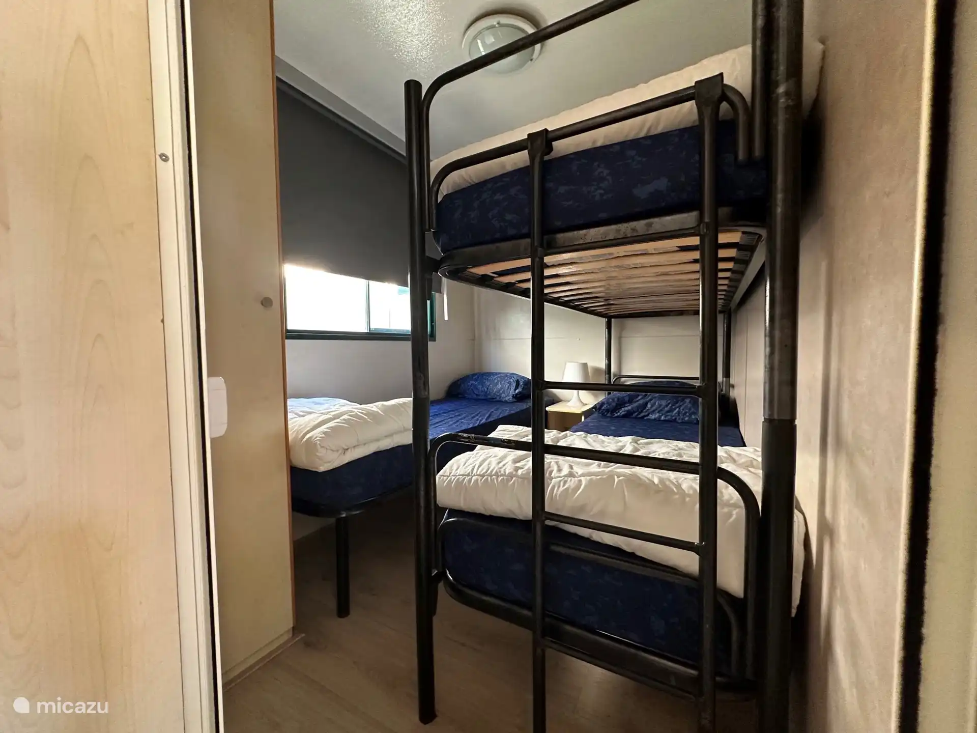 Room with 3 beds