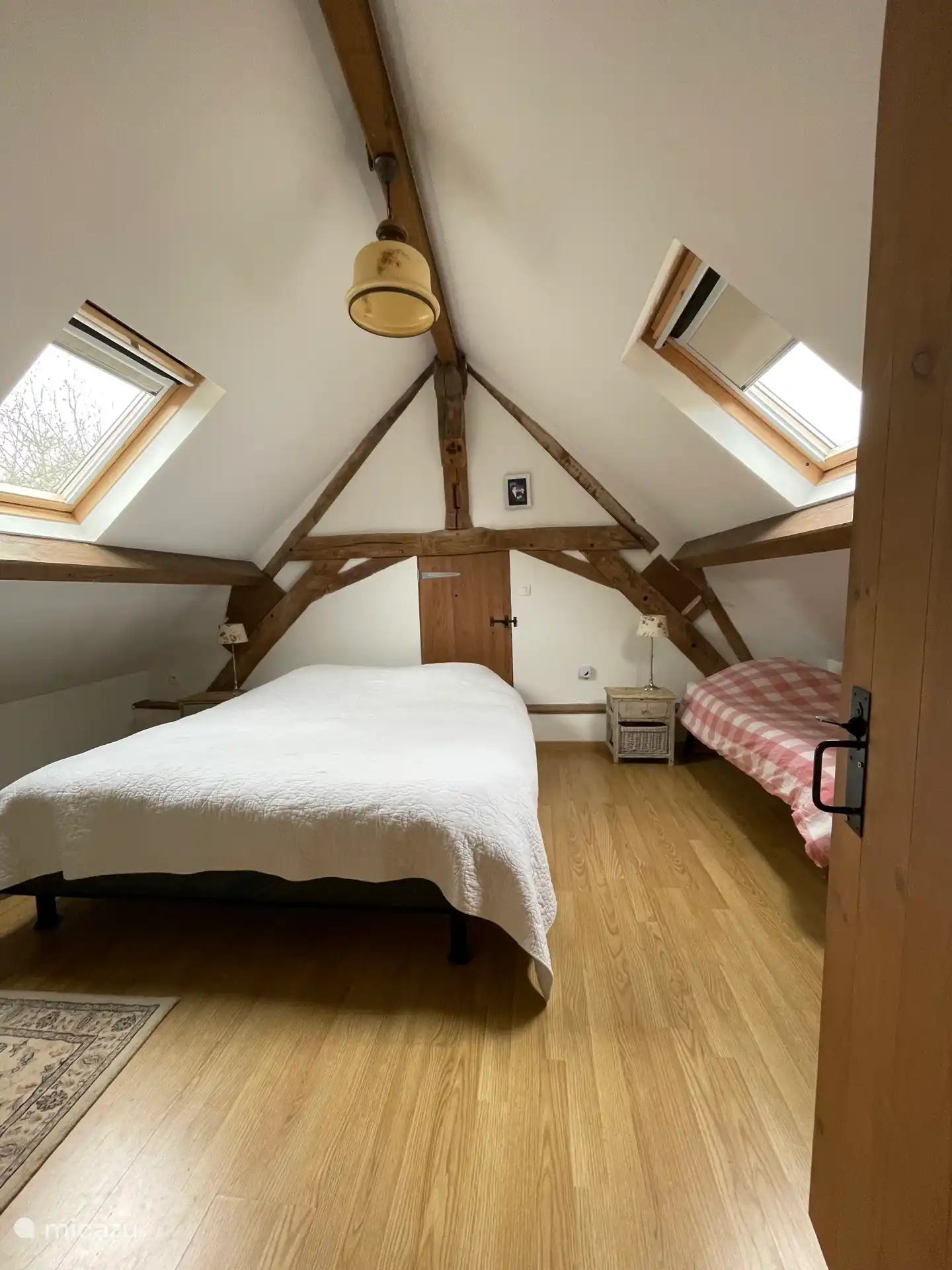 Schlafzimmer 3 mit einem Doppelbett und einem Einzelbett.