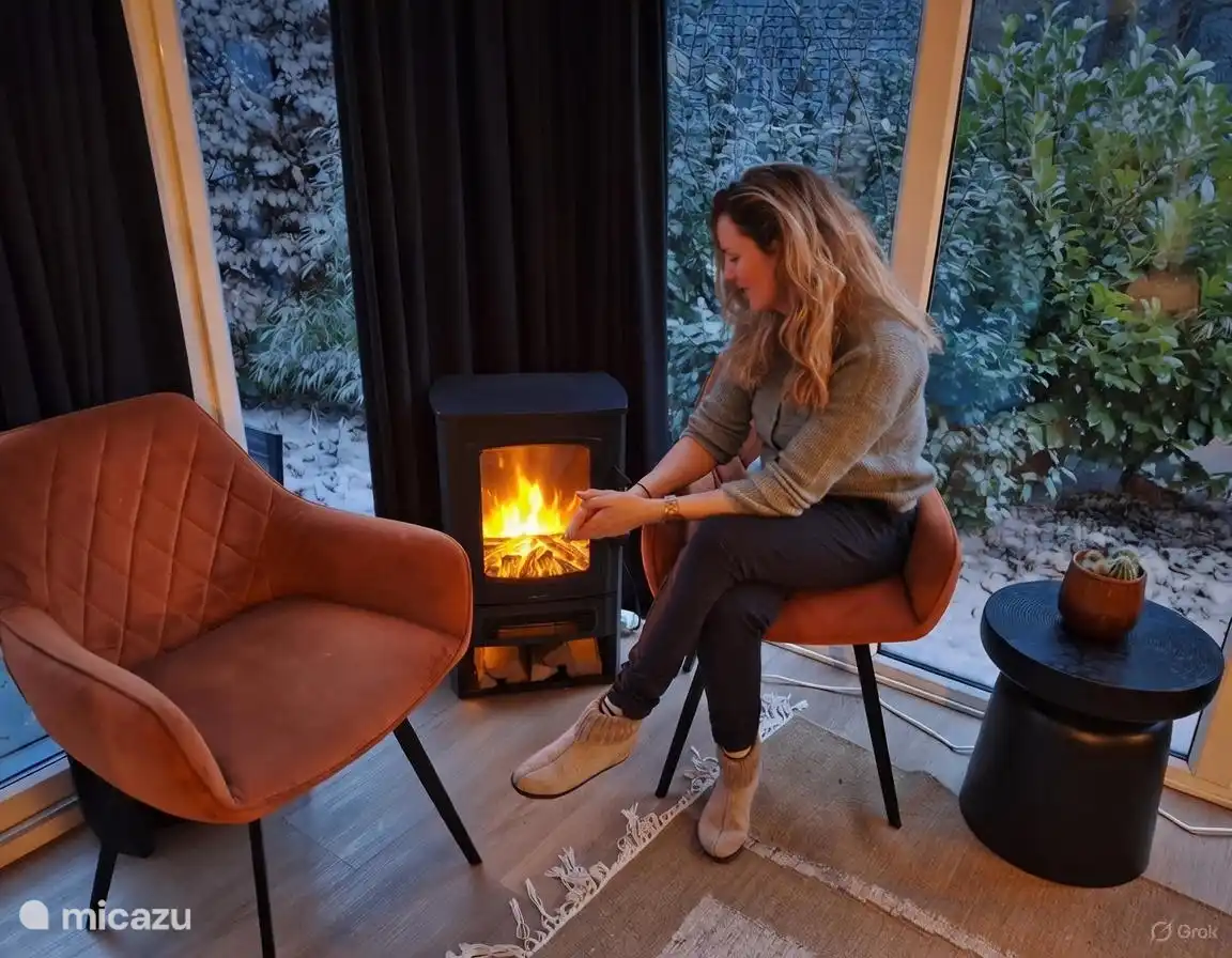Na een winterse boswandeling heerlijk omwarmen bij de openhaard.