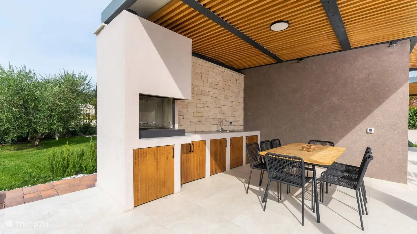 Veranda con barbacoa