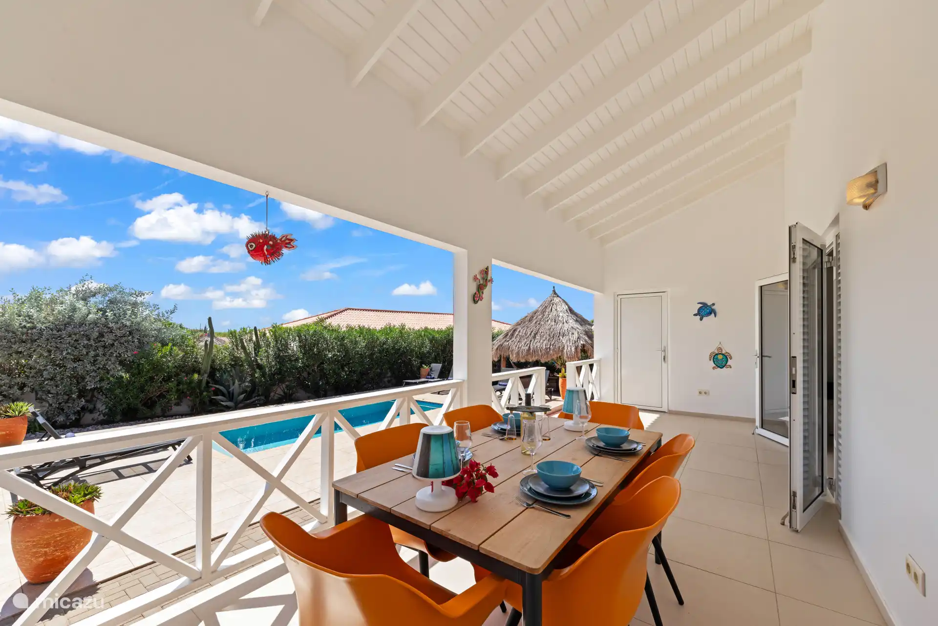 Op de porch kun je heerlijk zitten en genieten van het ontbijt, lunch of diner.