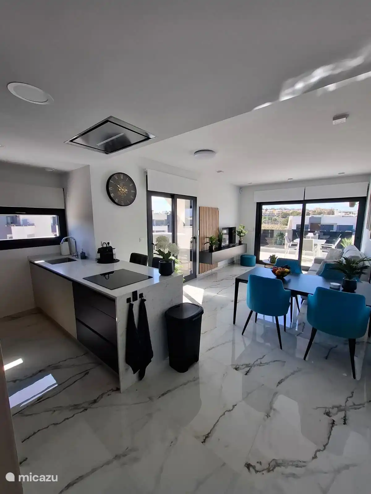 spacious living room with open kitchen