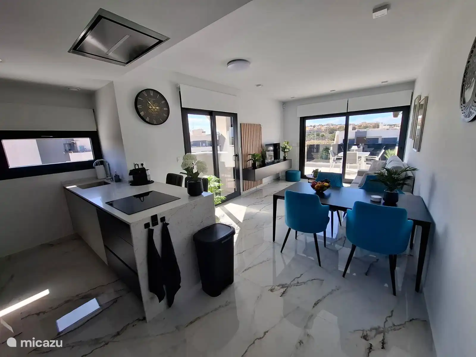 cozy spacious living room with open kitchen