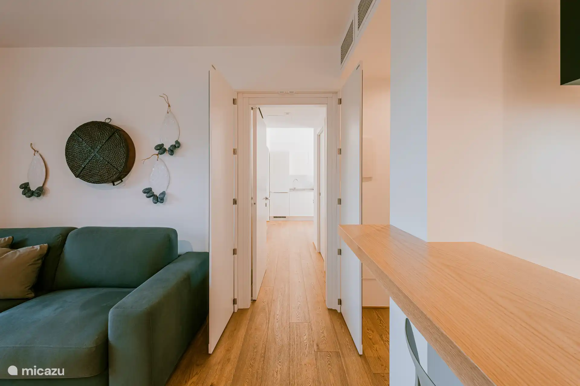 Indien gewenst kunnen de twee appartementen worden verbonden via een dubbele binnendeur, waardoor er één ruime woonruimte ontstaat.