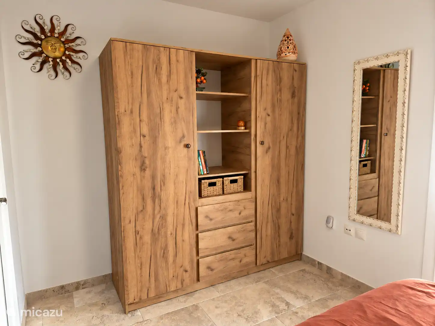 Master bedroom with spacious closets and access to the balcony on the west side.