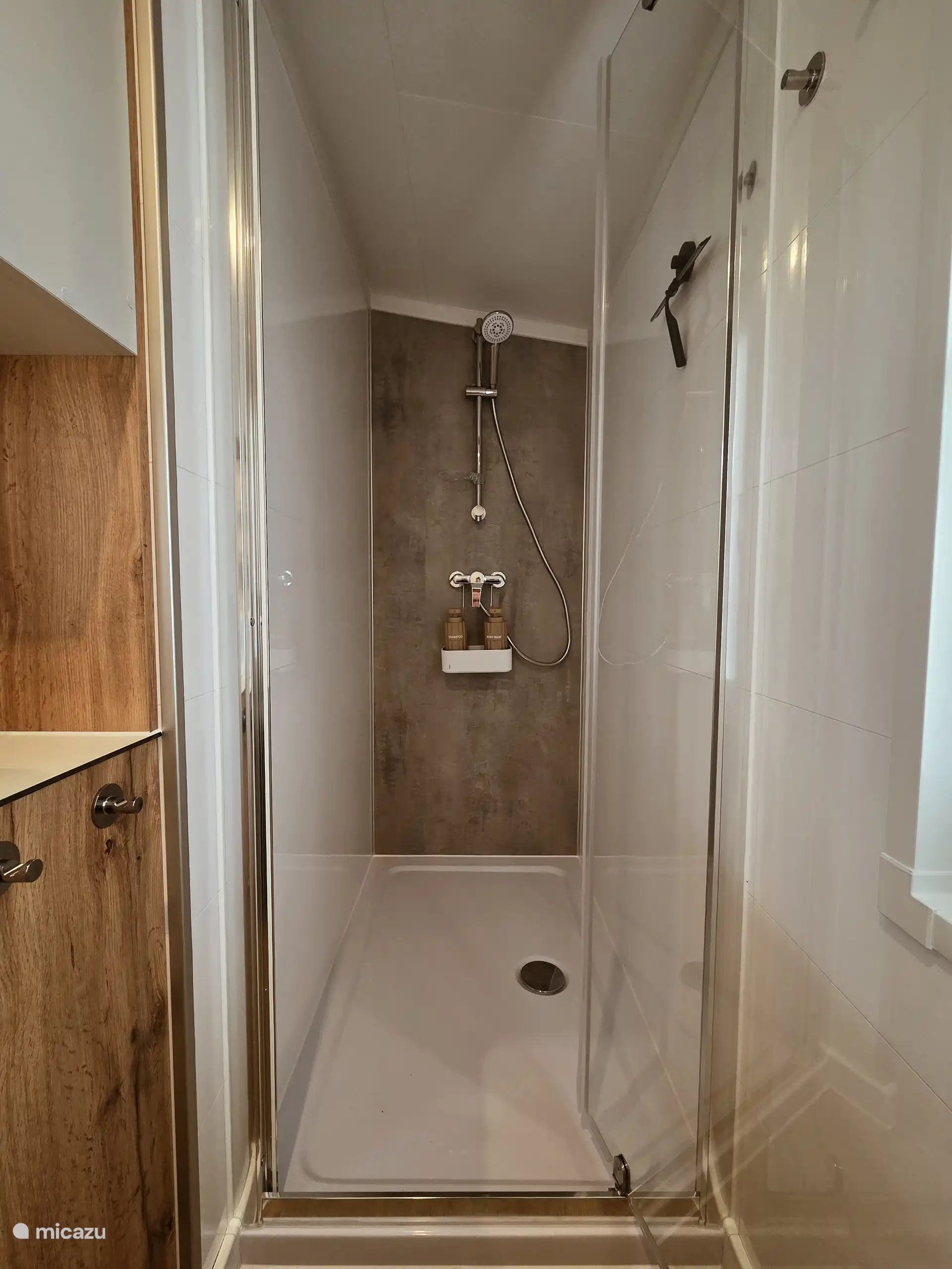 De ruime inloopdouche