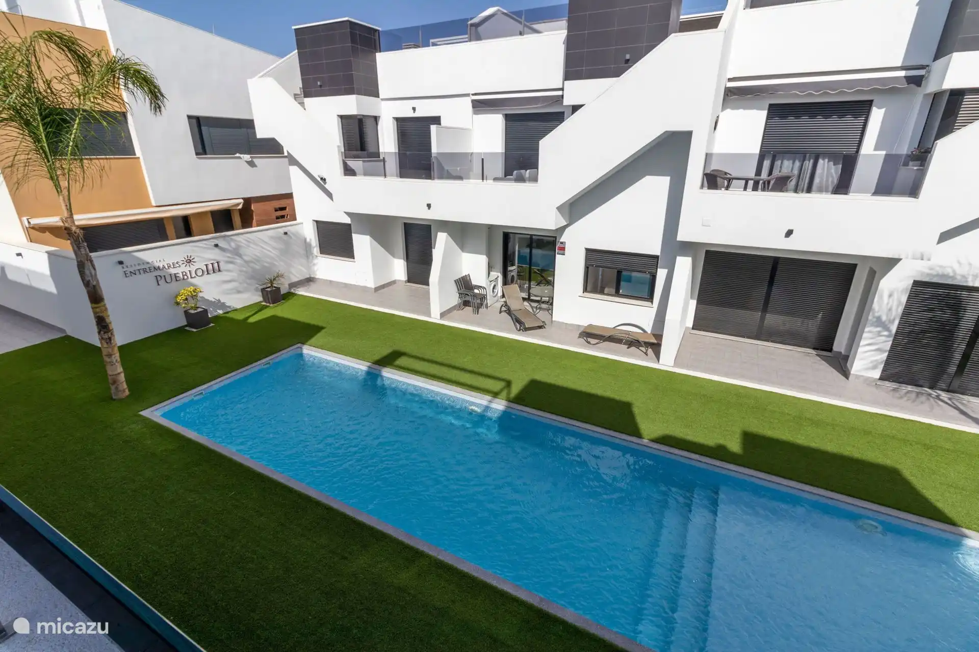 View across pool from solarium