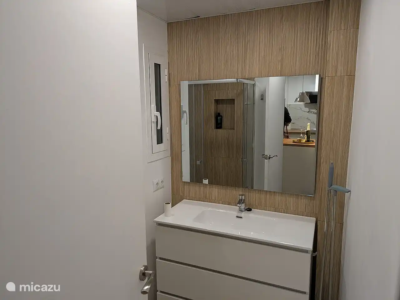 Bathroom with toilet and rain shower
