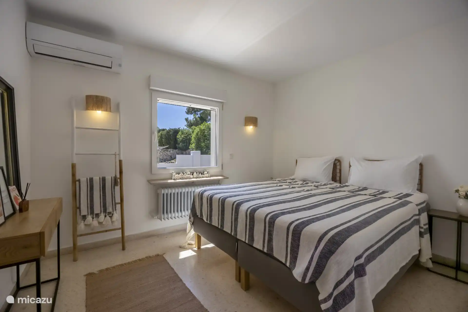 Slaapkamer 4: voorzien van twee één- persoonsbedden (200 x 90)