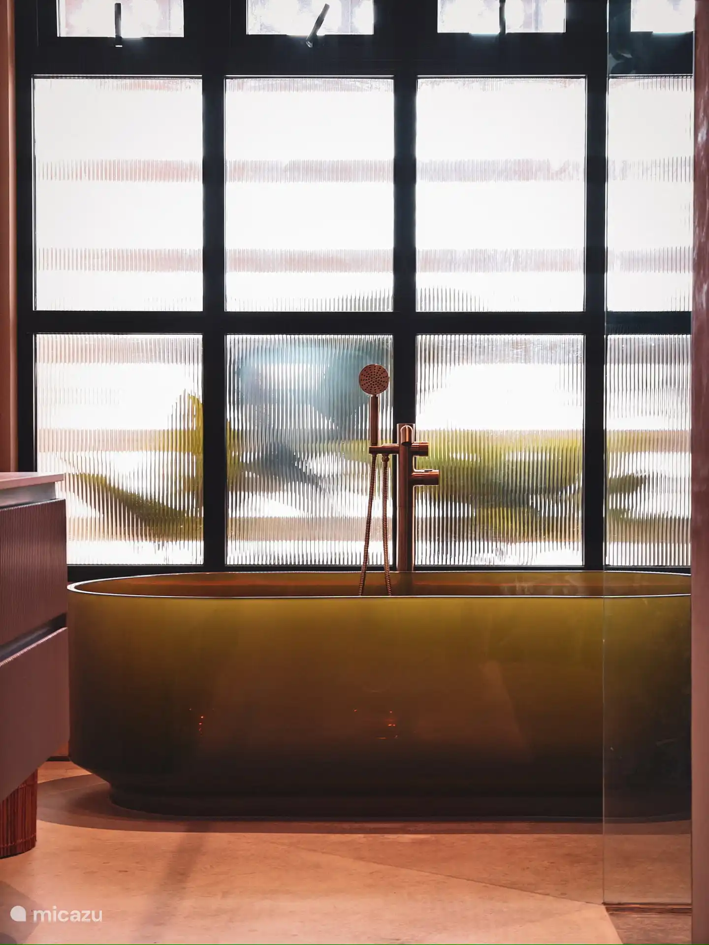 Olive green bath to dream away in.