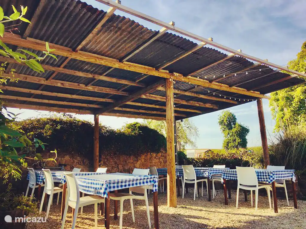 The covered table d'hôtes area (summer)