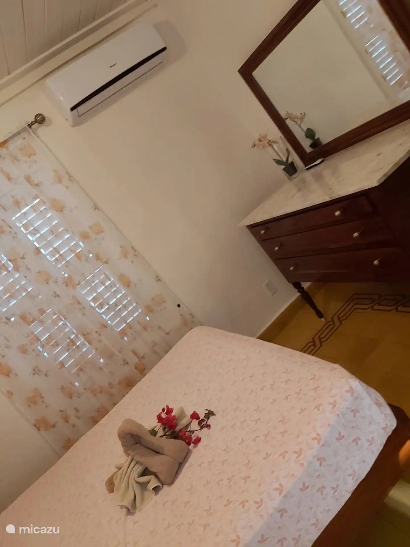 Slaapkamer met airco.