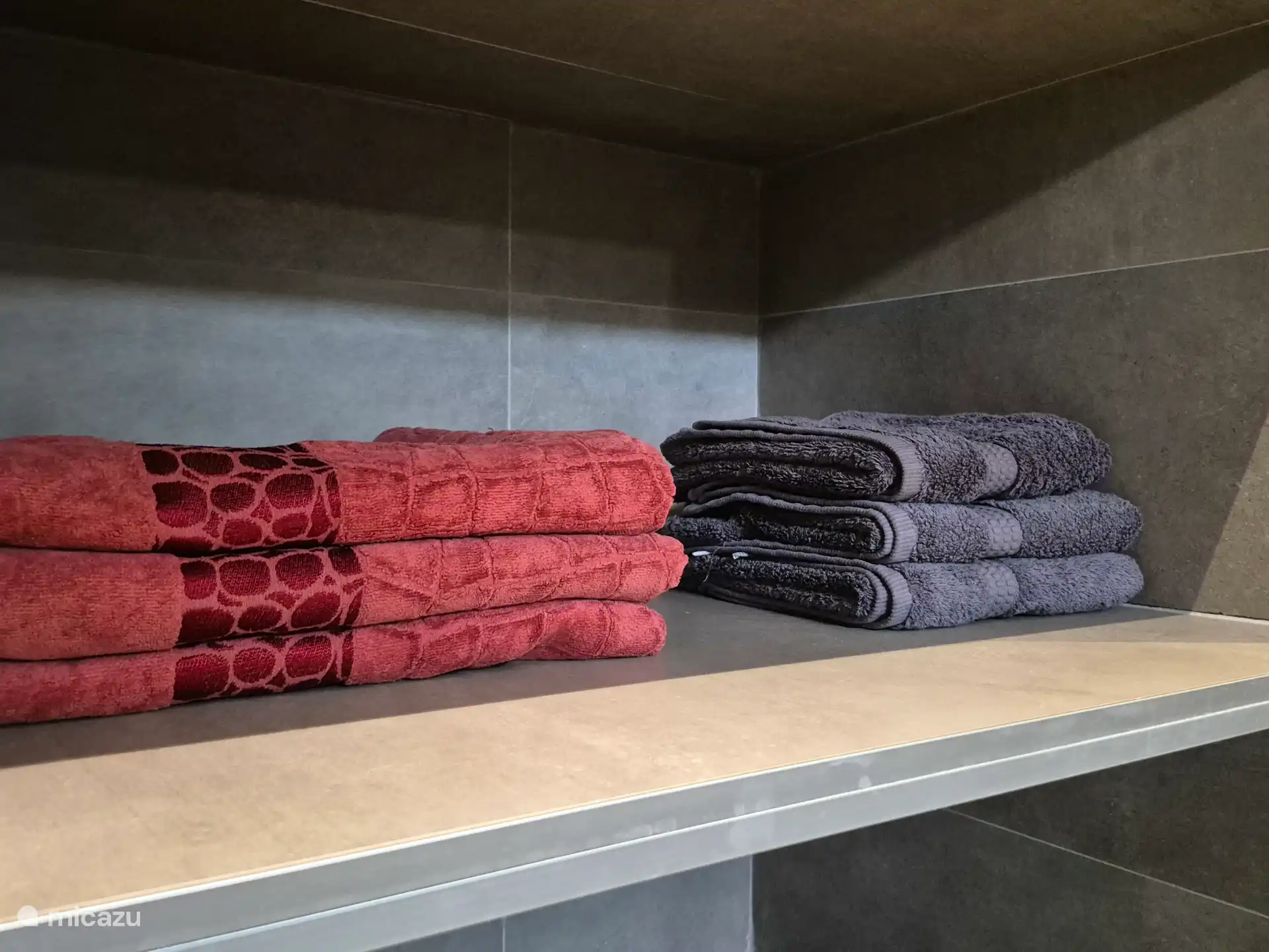 Handdoeken voor de derde privébadkamer.