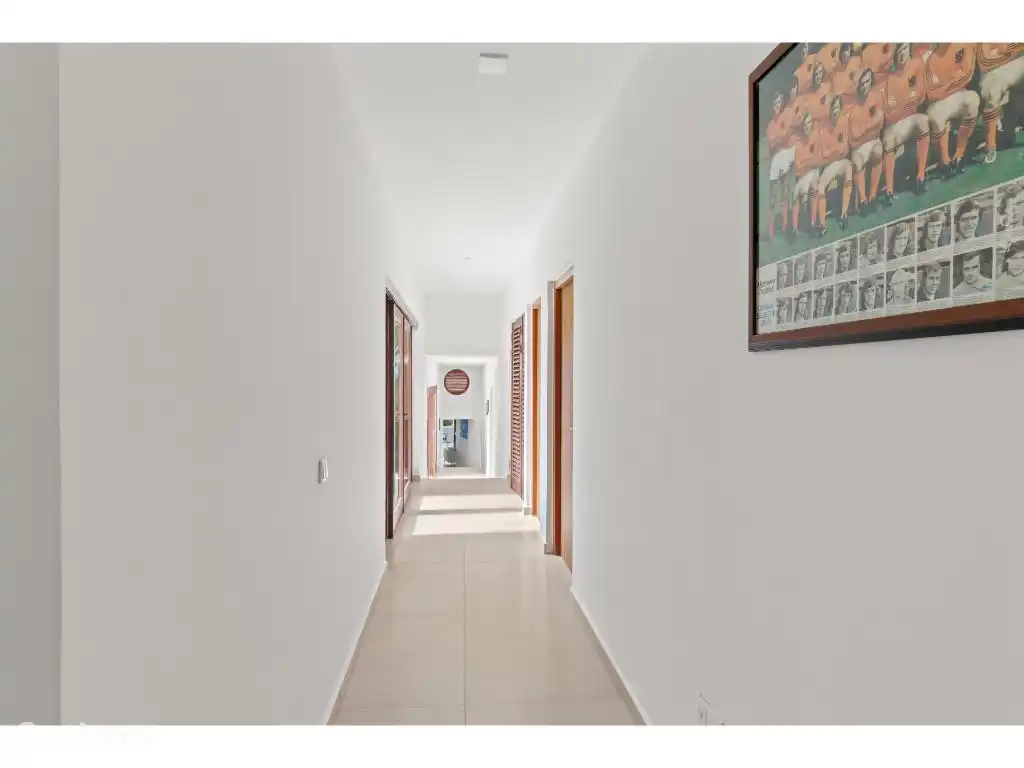 Hallway to 3rd bedroom and office