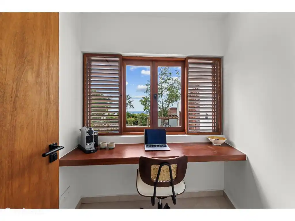 Office space with Nespresso machine and sea view