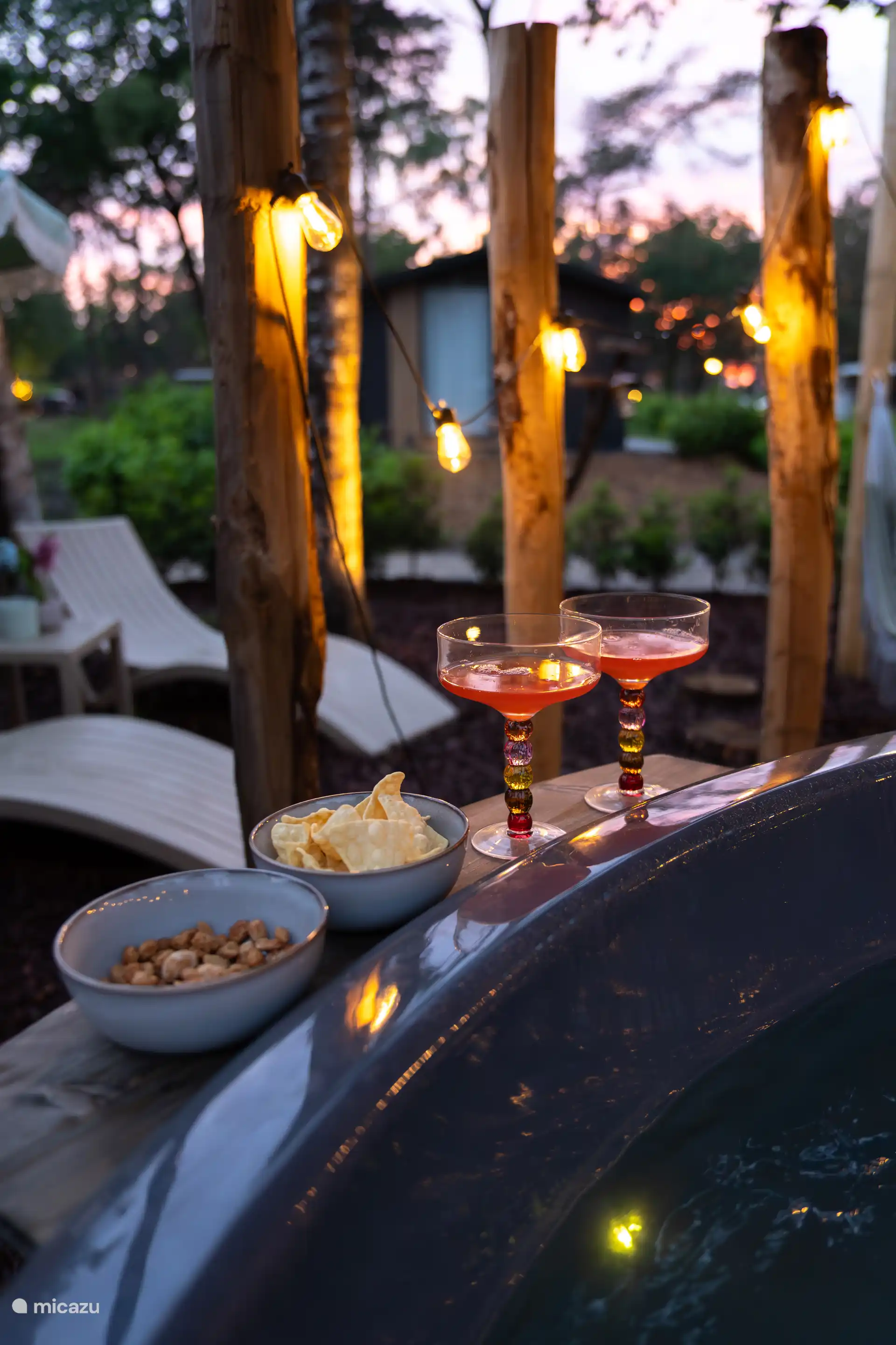 Private hot tub with massage jets and lighting