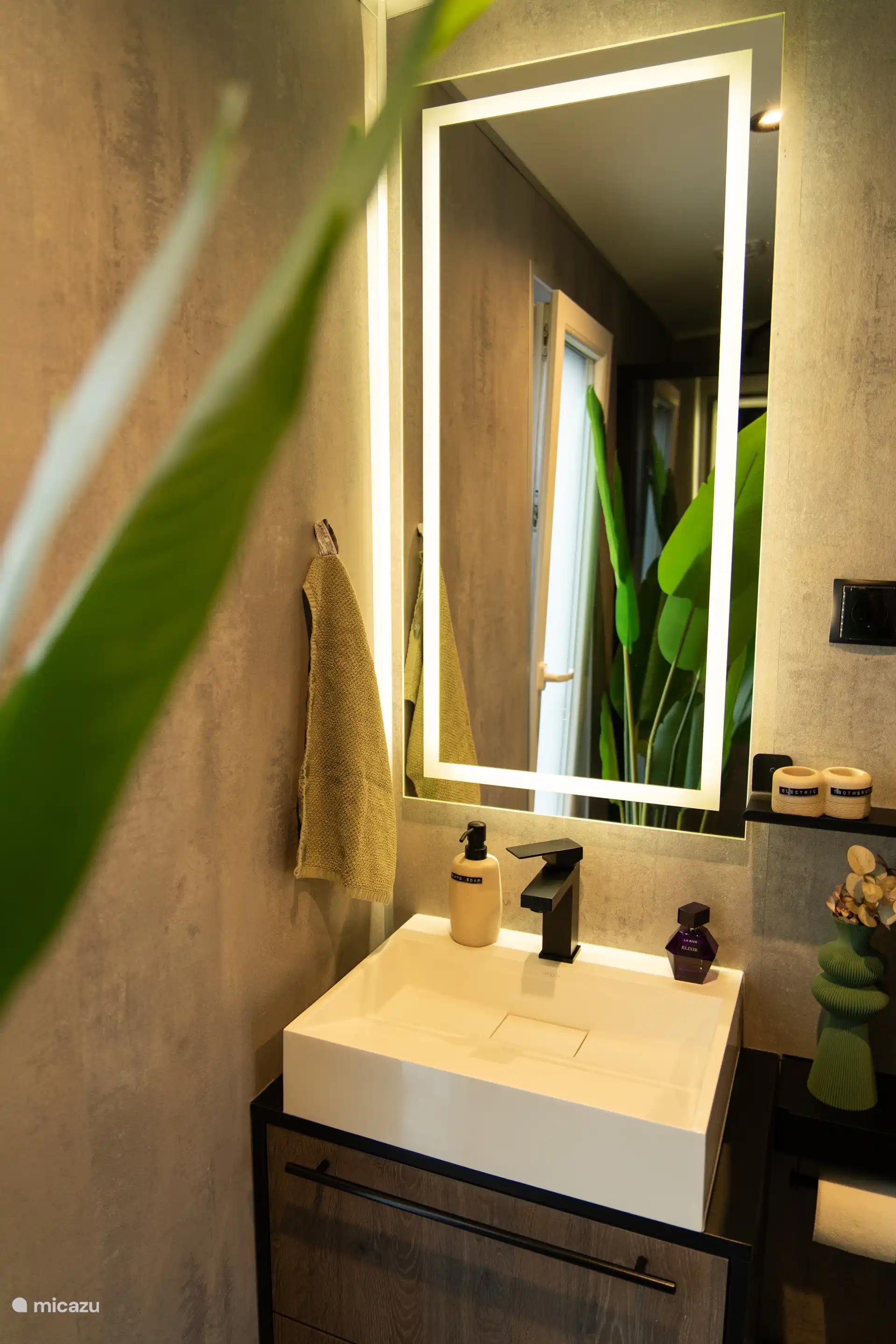 Large luxury shower with various care products 