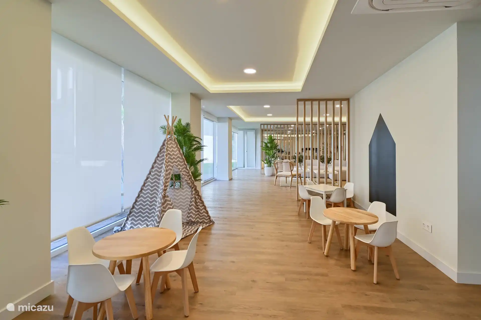 Club social con rincón infantil