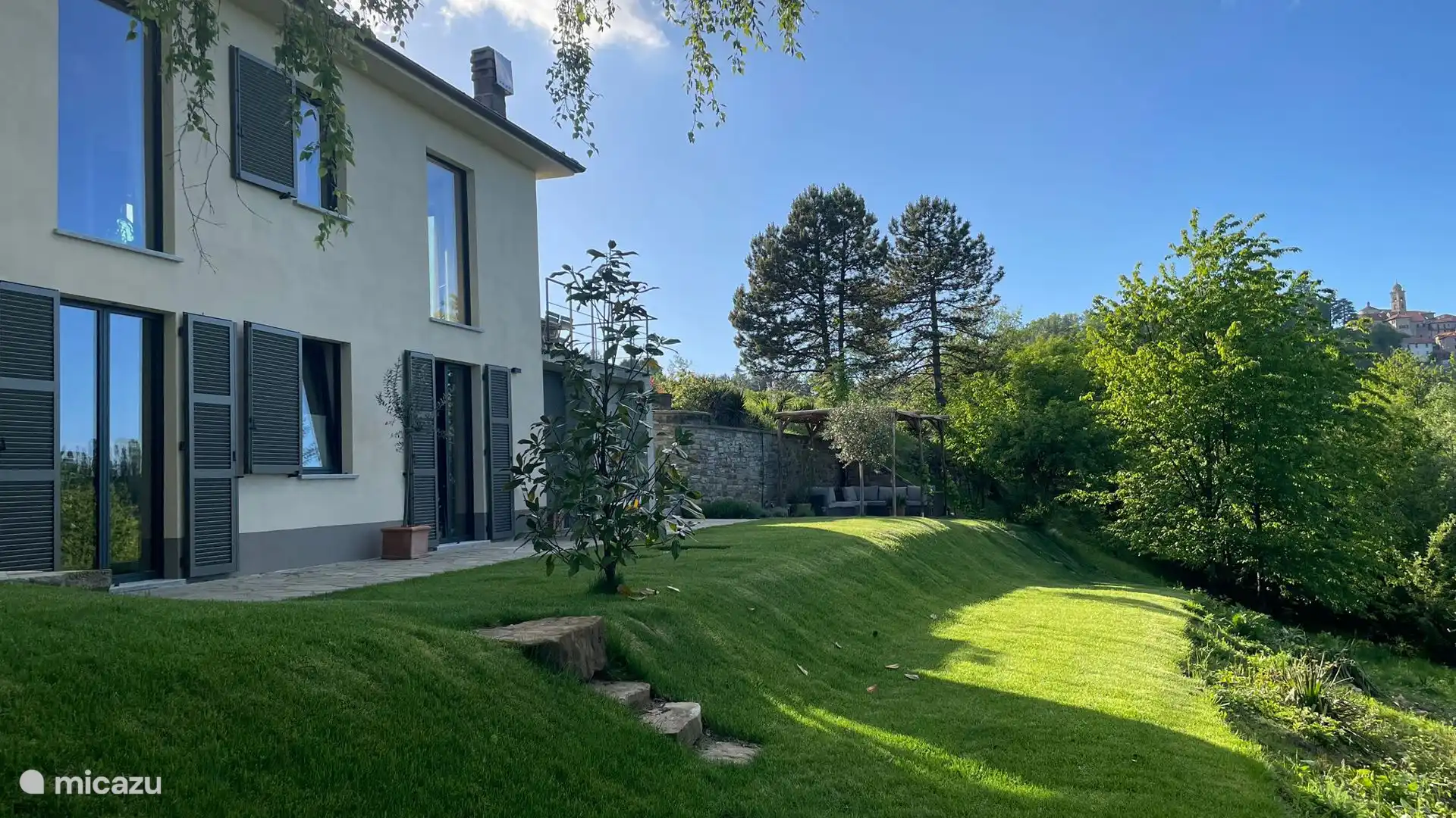 Rear, the garden has a lot of privacy. Overlooking the small village of Roccaverano. 