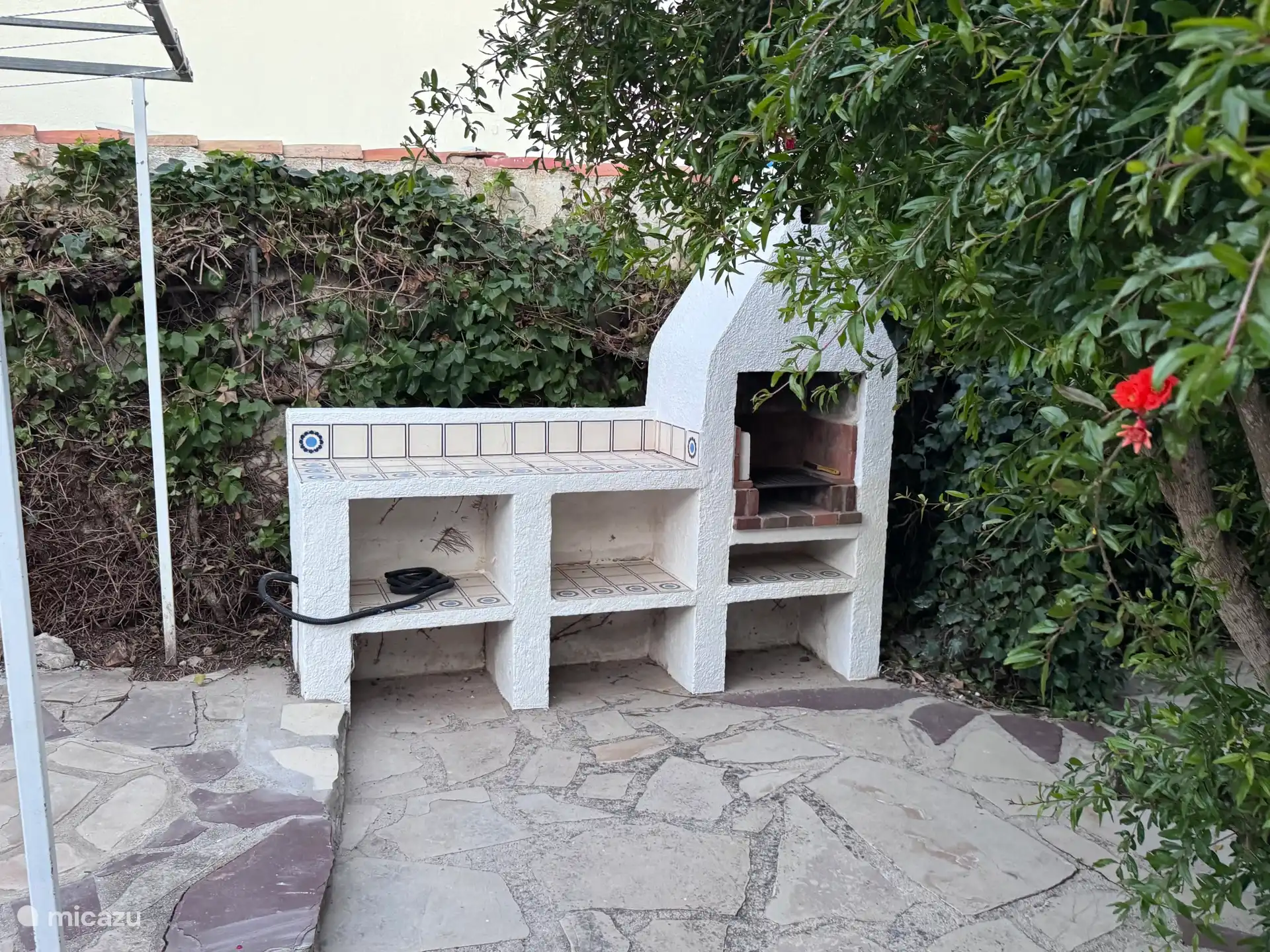 De buitenkeuken.