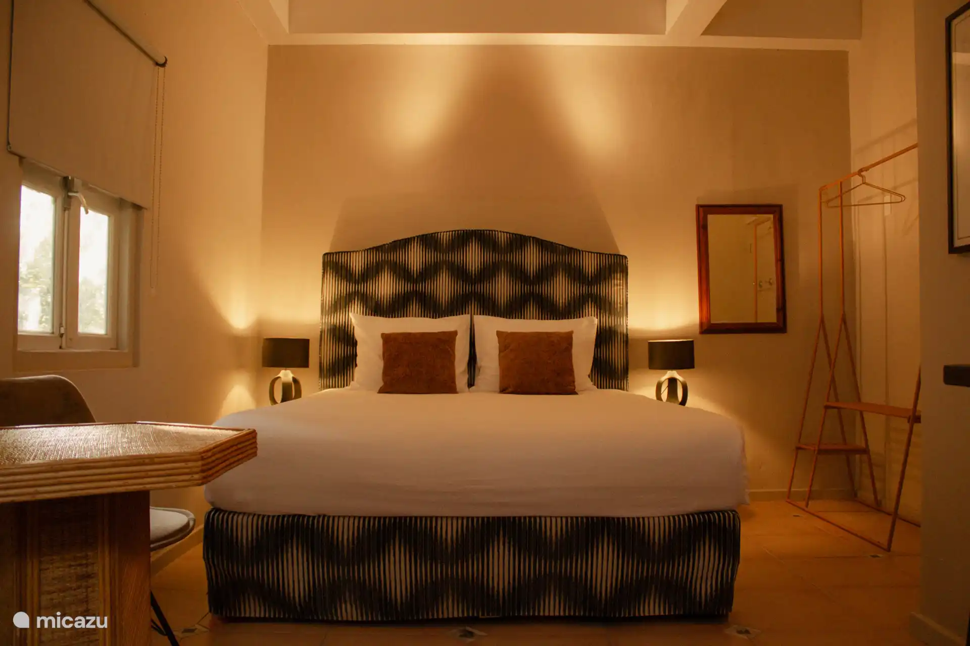 El tercer dormitorio, con baño privado y su propia cocina pequeña. 