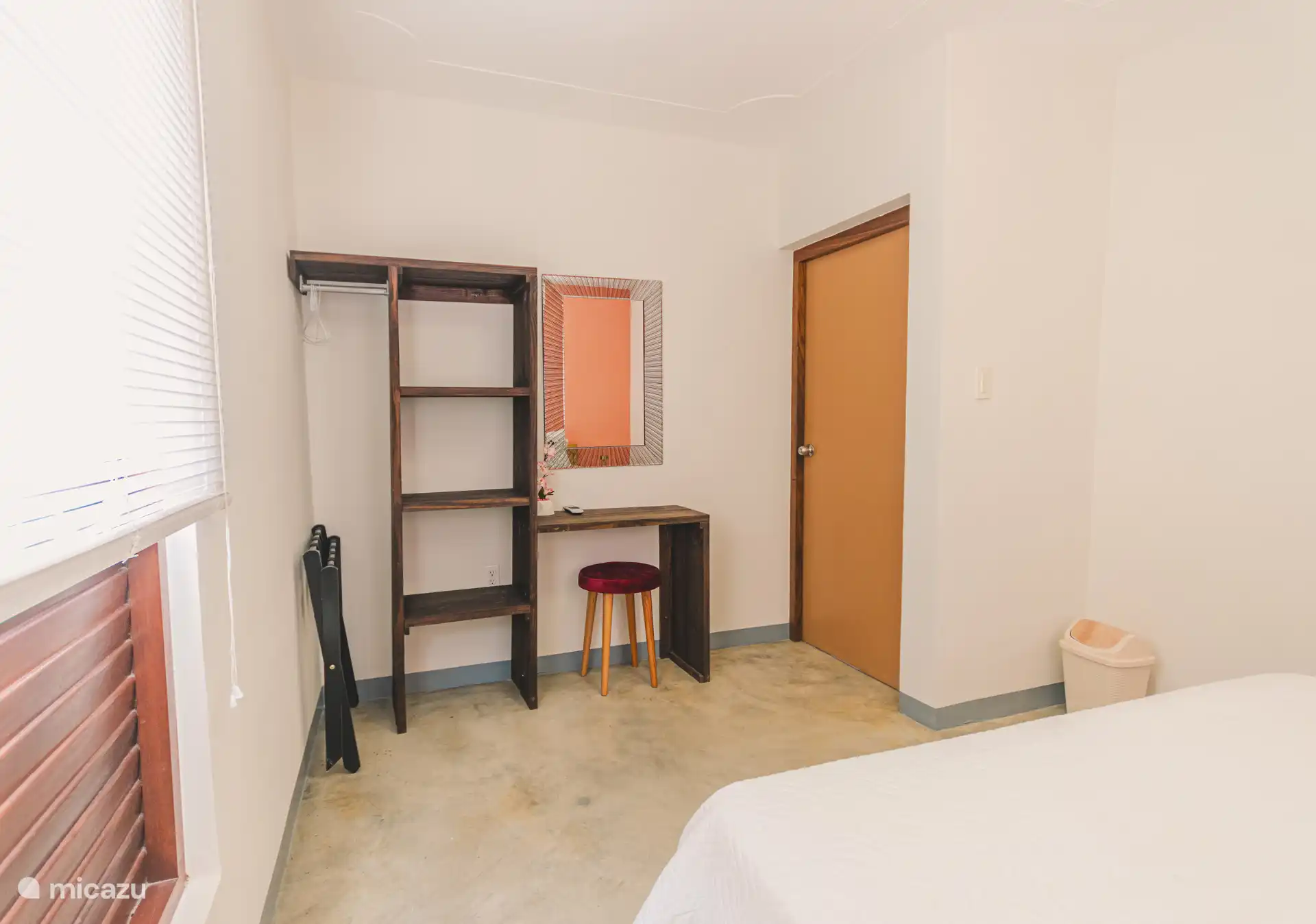 Entrance Bedroom 1, this is located on the left side of the kitchen, the image is taken from the inside.