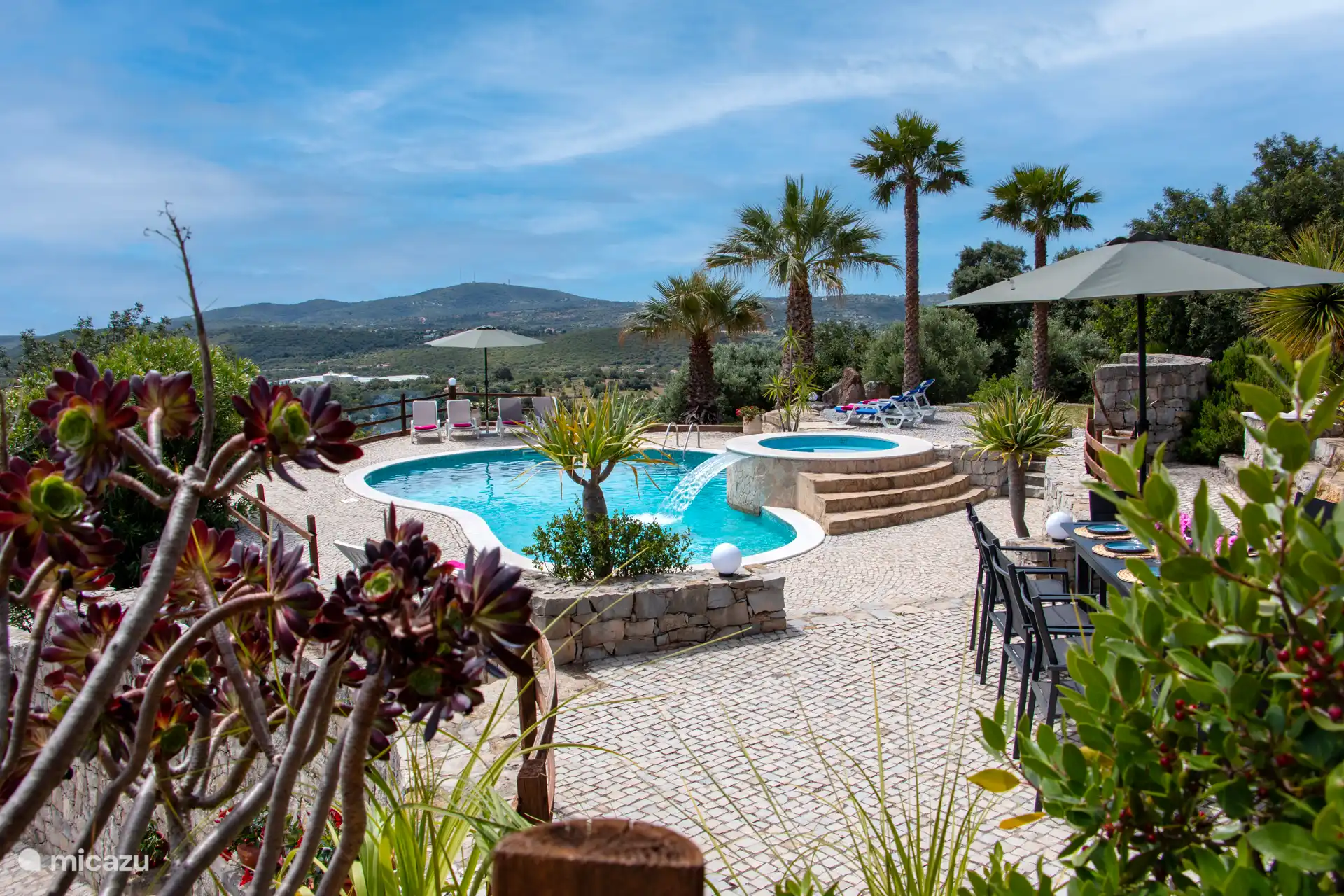 garden with pool and mountain views
