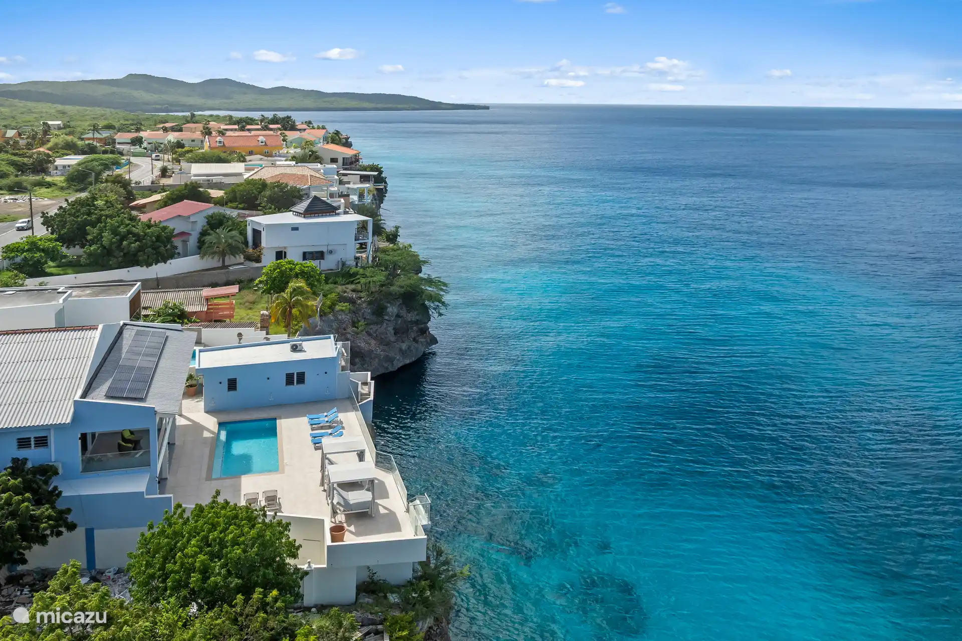 Laisse-toi emporter par le soleil des Caraïbes, entouré d’eaux turquoise,