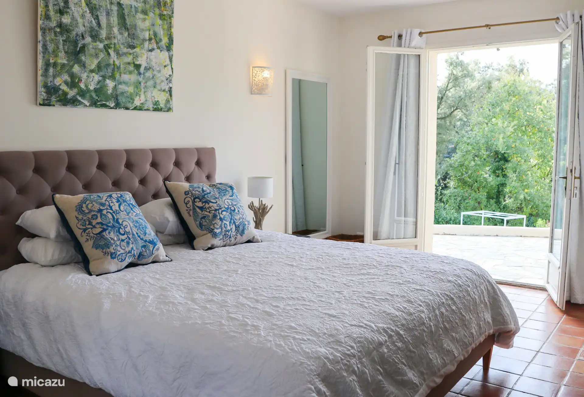 Slaapkamer met directe toegang tot het terras