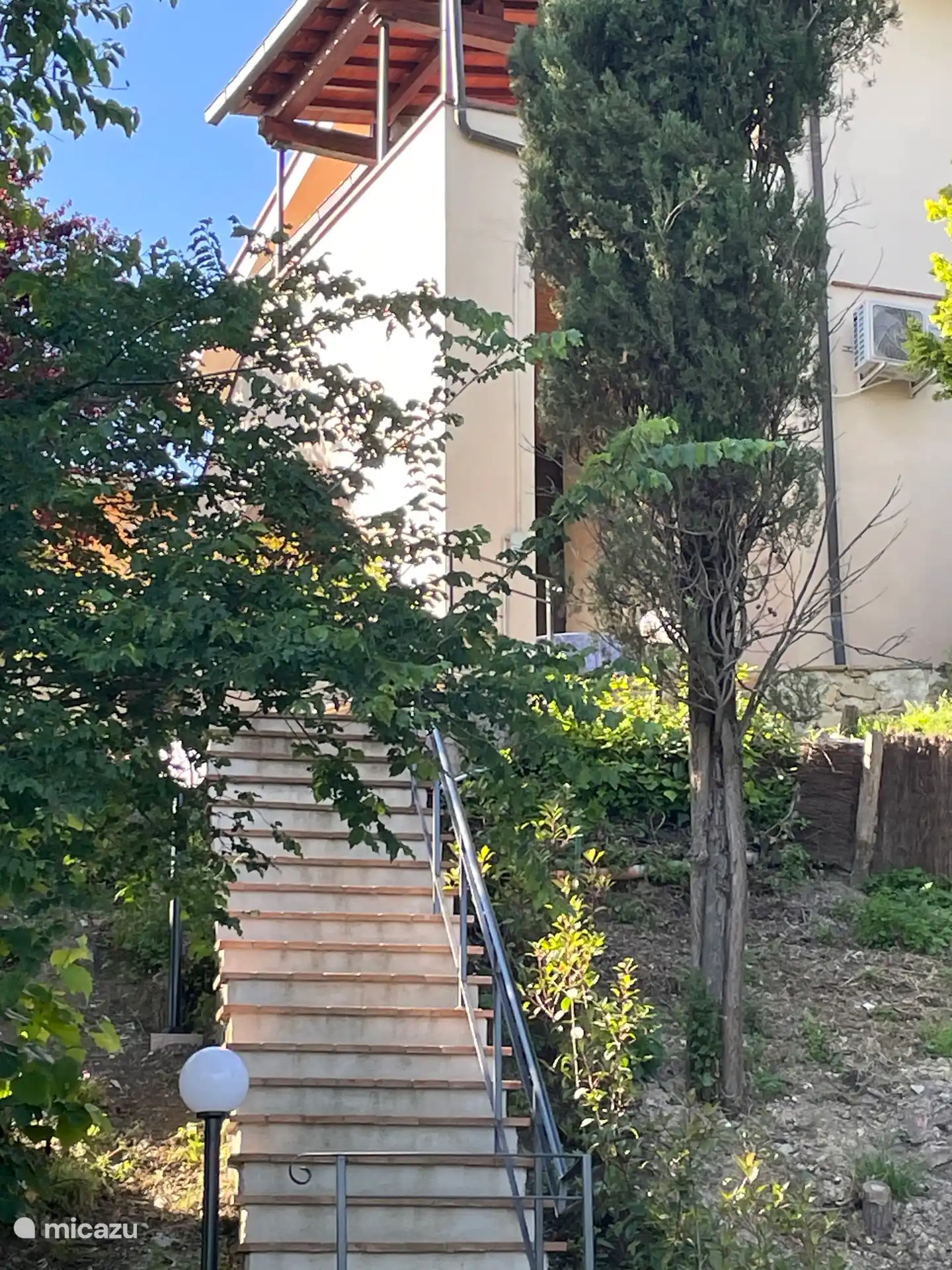 The stairs to and from the pool
