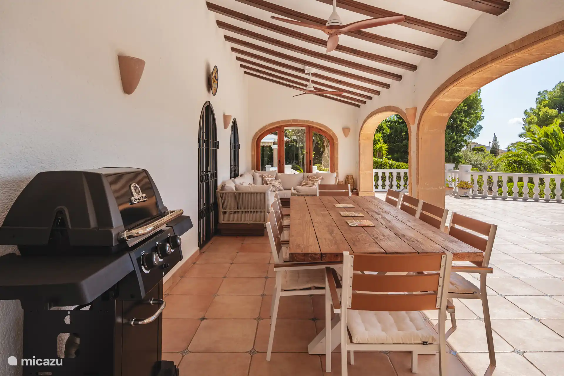 BBQ with large dining table.