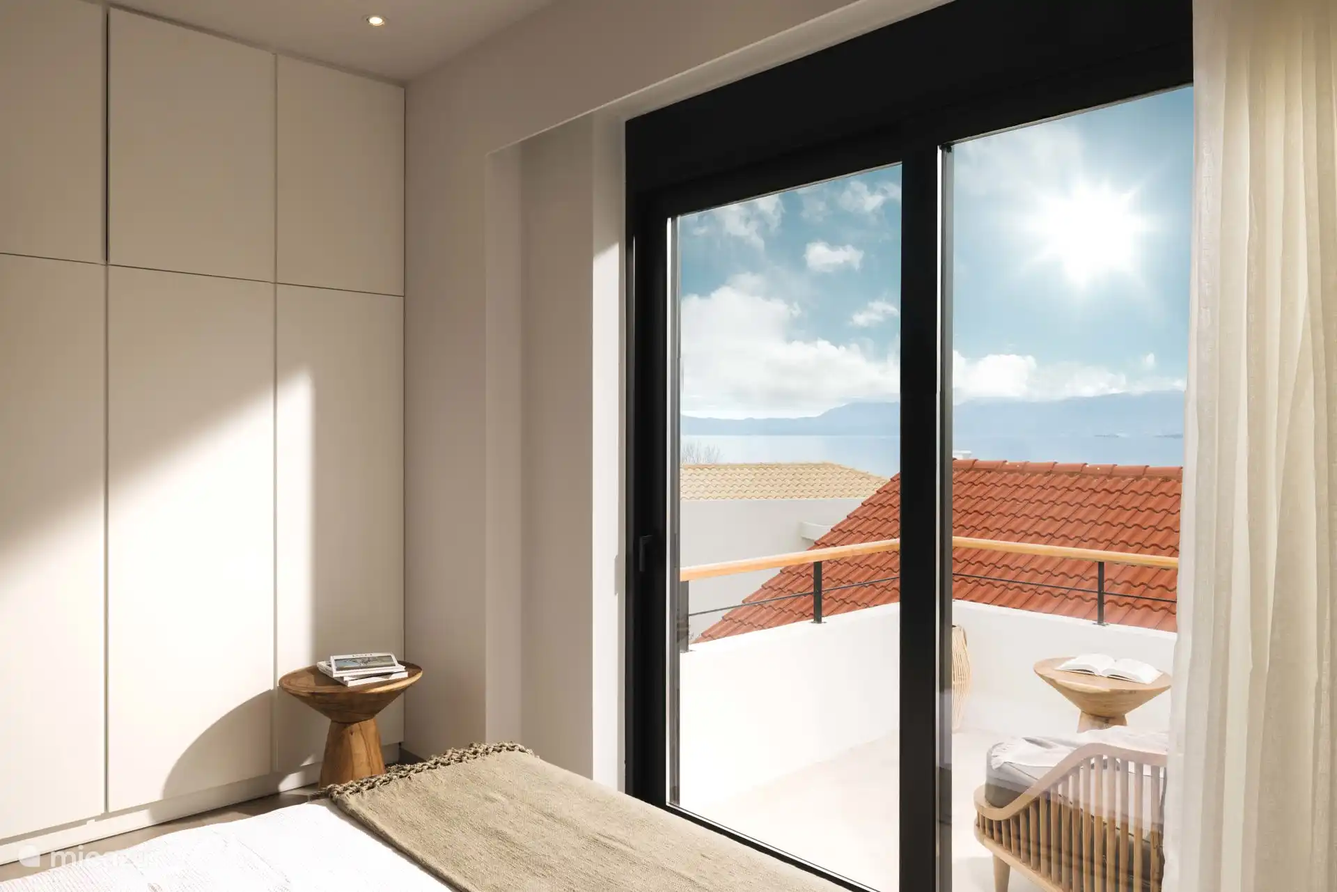 Balkonzicht vanuit slaapkamer