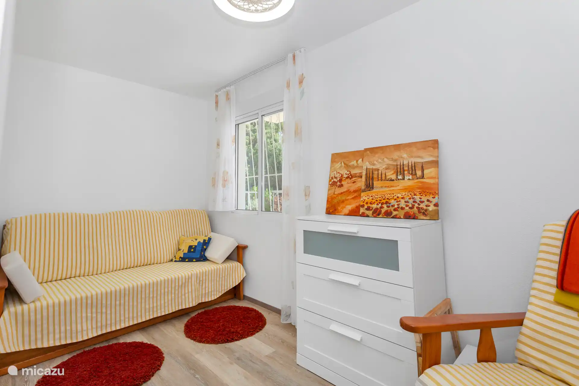 Chambre avec canapé-lit