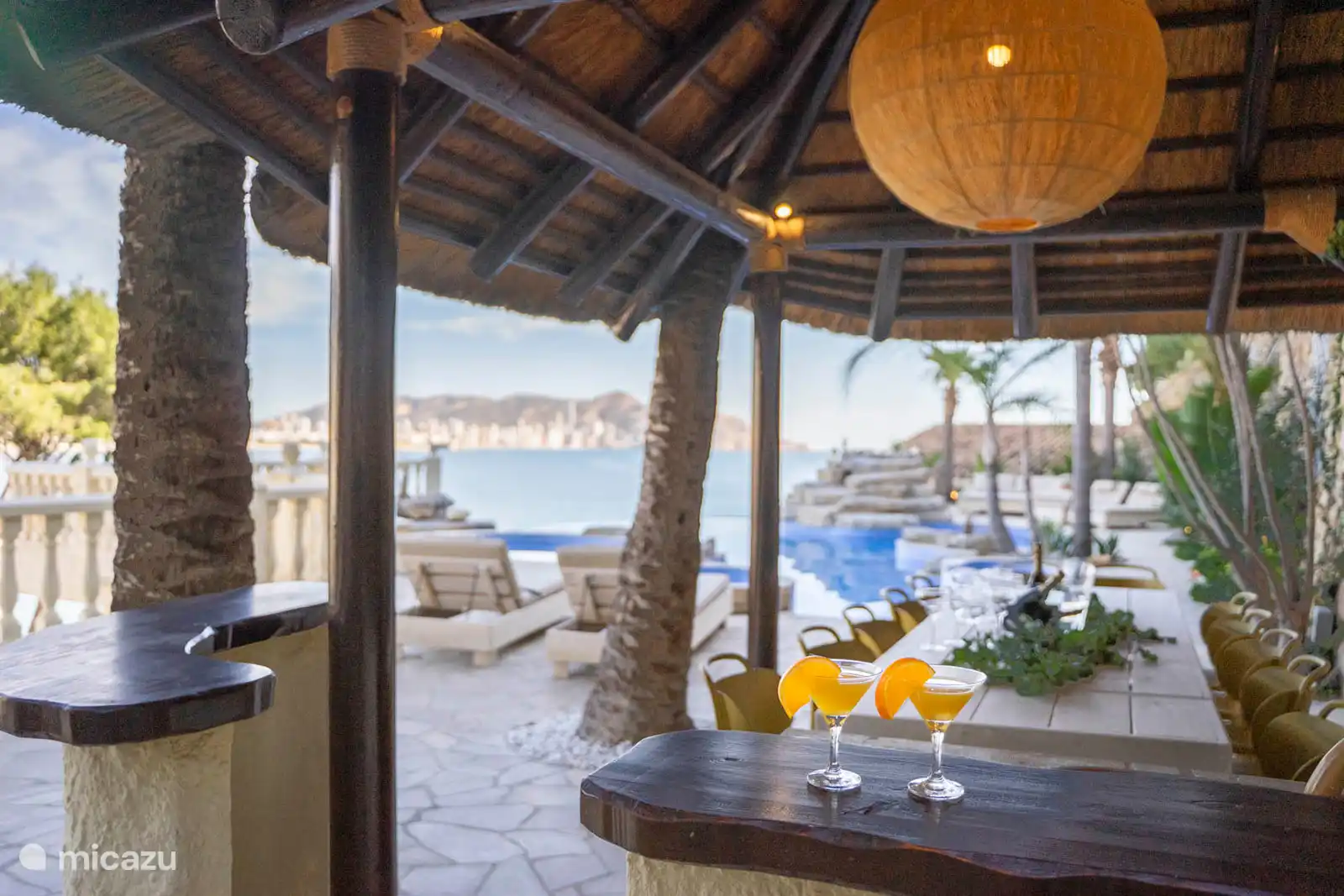 Dining room by the pool, sea view.