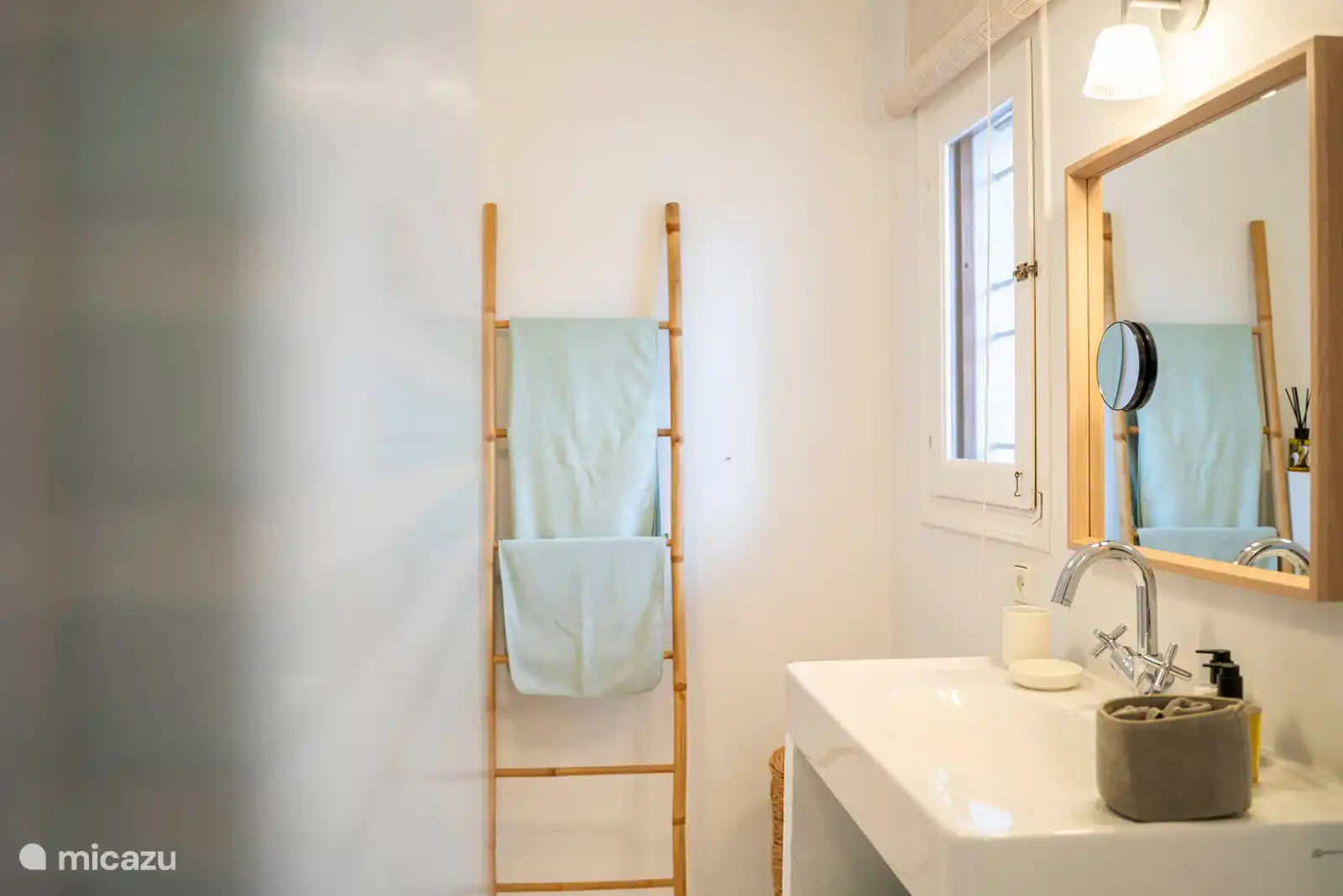 Bathroom with shower shared between bedroom 2 and 3.