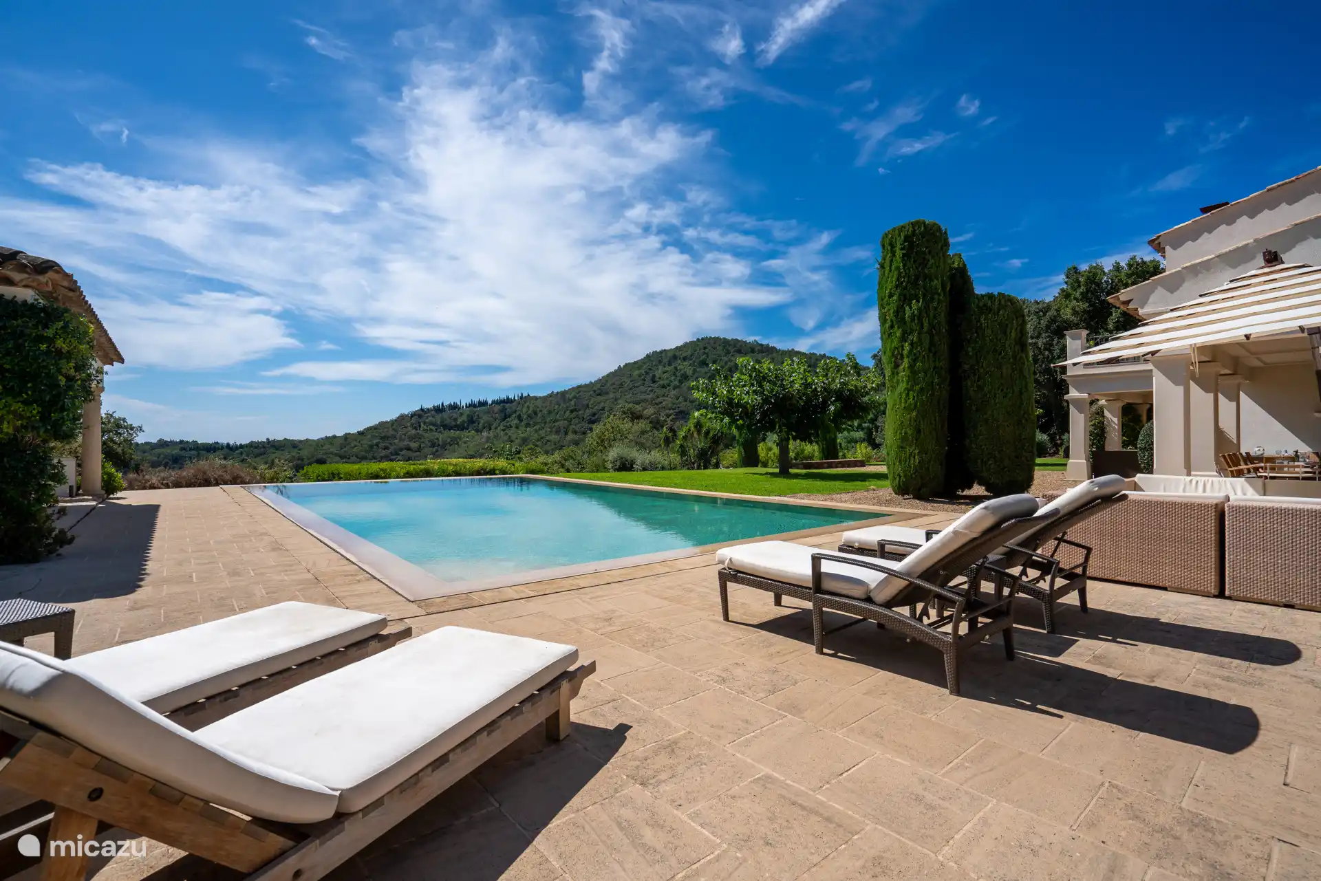 Miror pool and sun loungers