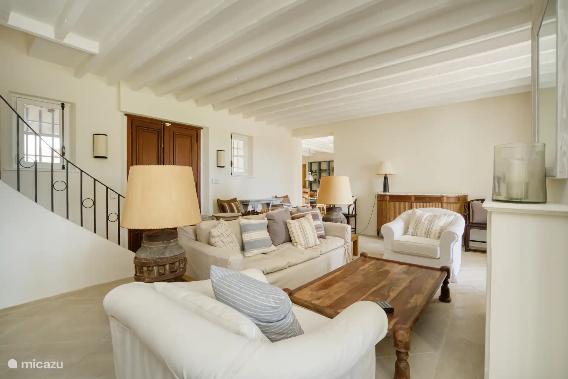 Living room with fireplace and direct access to the terrace