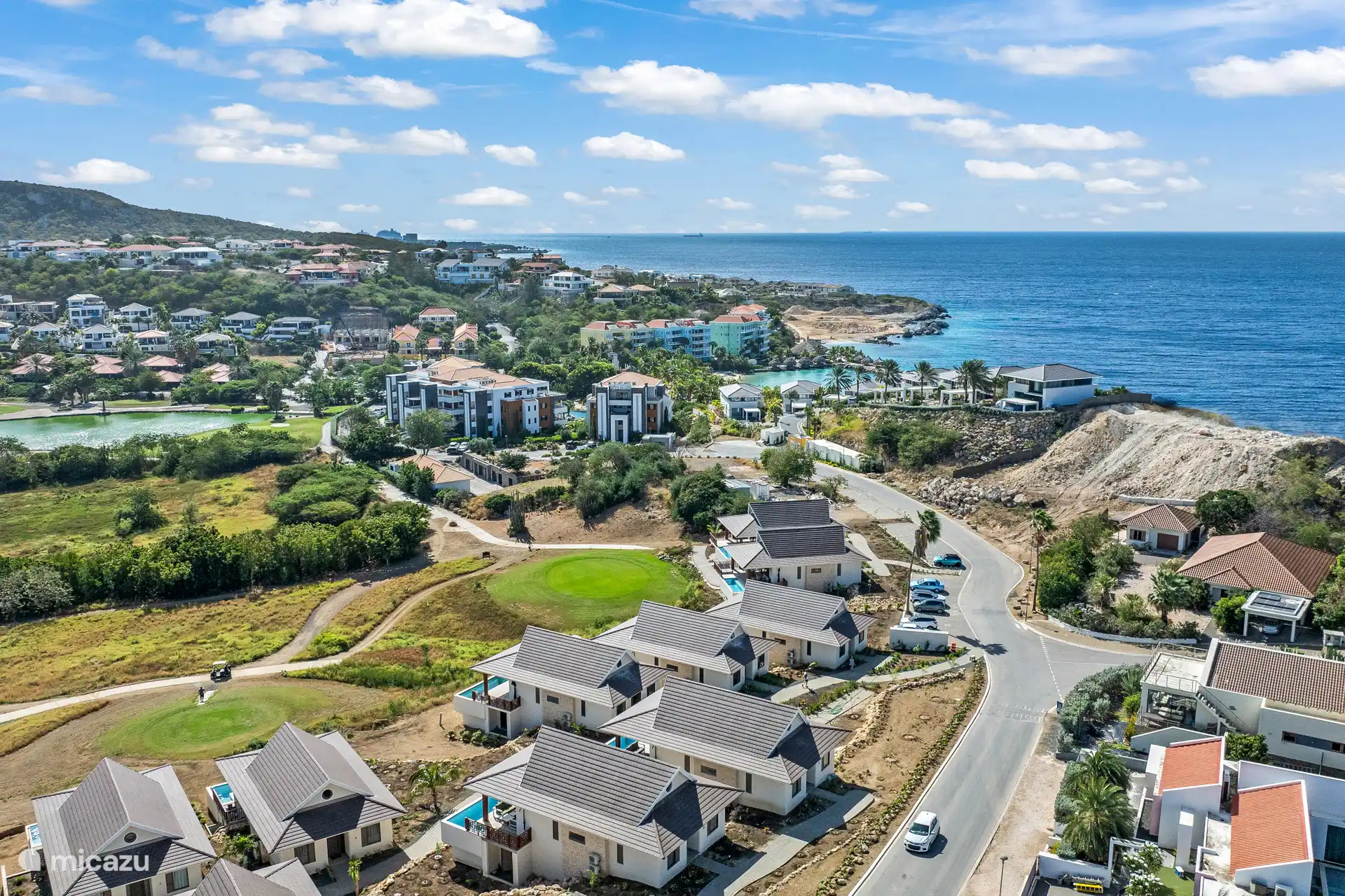 From the villa it is only a 350 meter walk to the white sandy beach of Blue Bay.