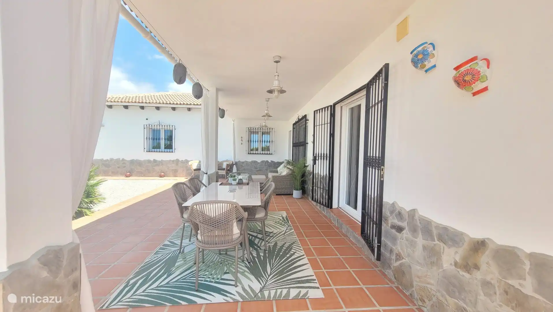 Dining table under canopy