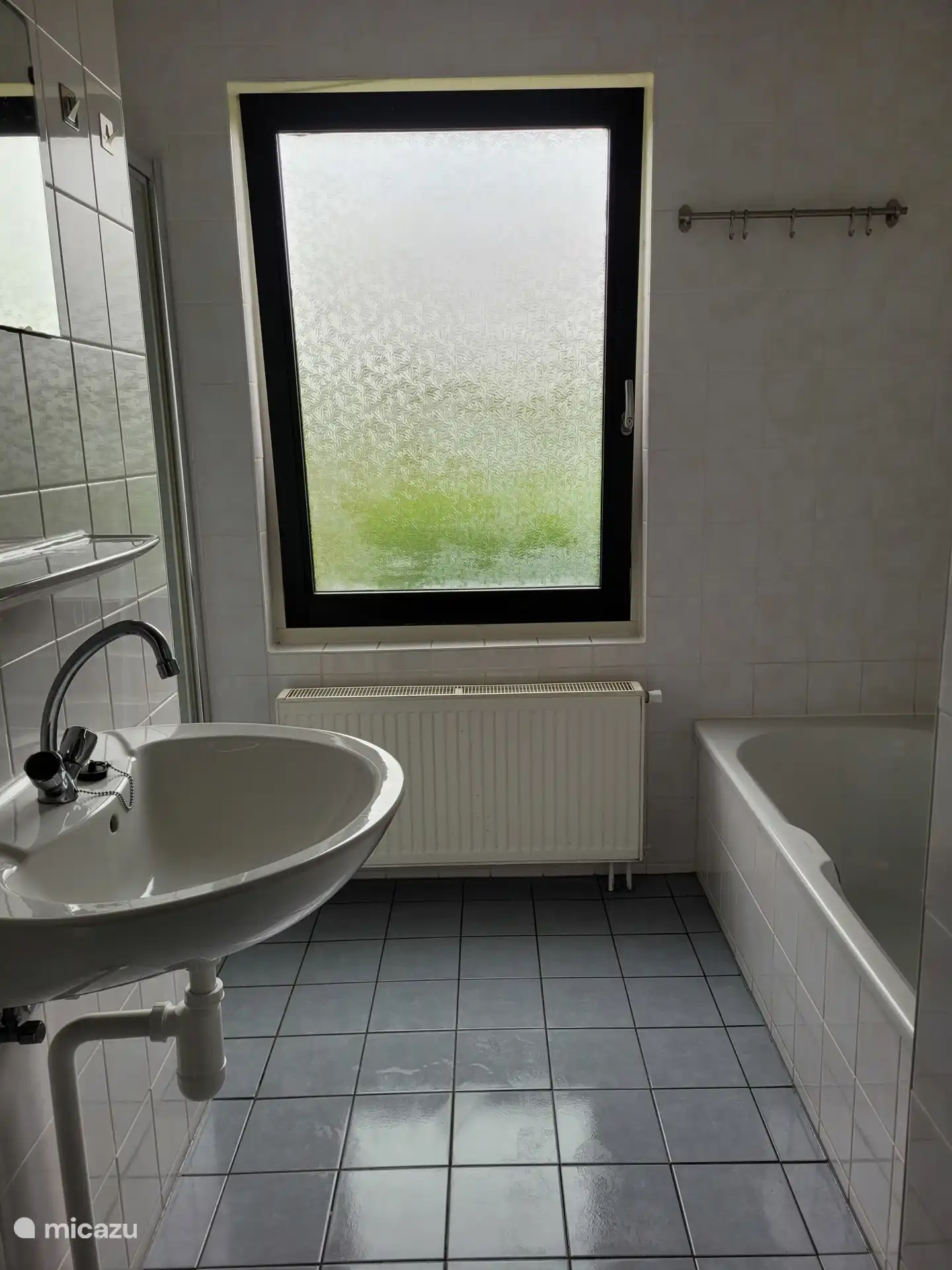 Bathroom with bath and separate shower