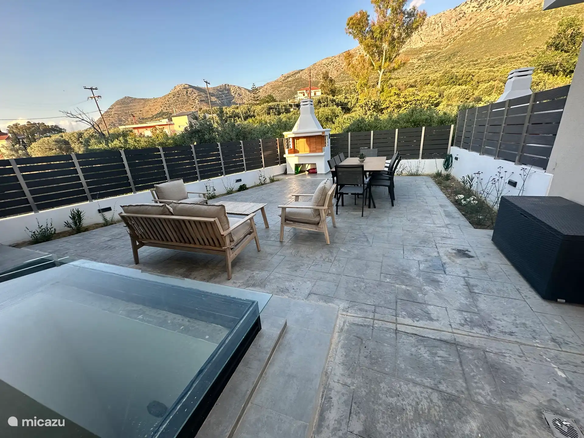 The back patio with the fantastic BBQ and the sitting area 