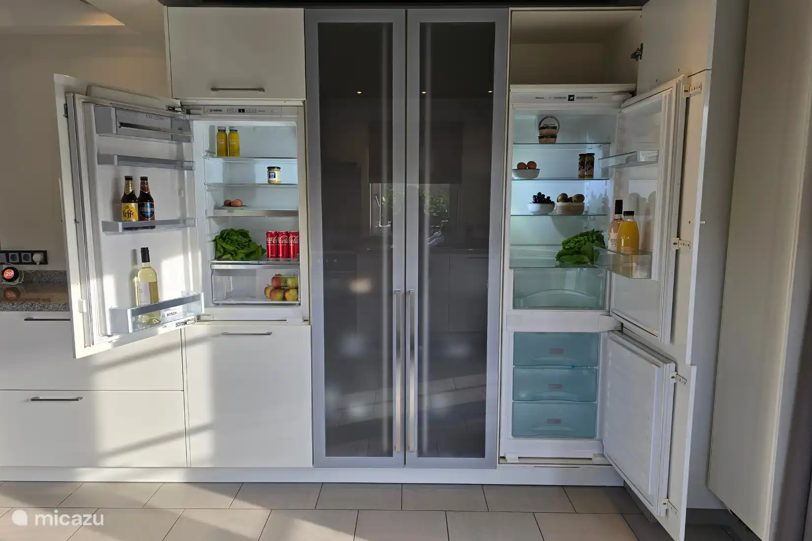 Kitchen with sufficient facilities for a group of 10 people.