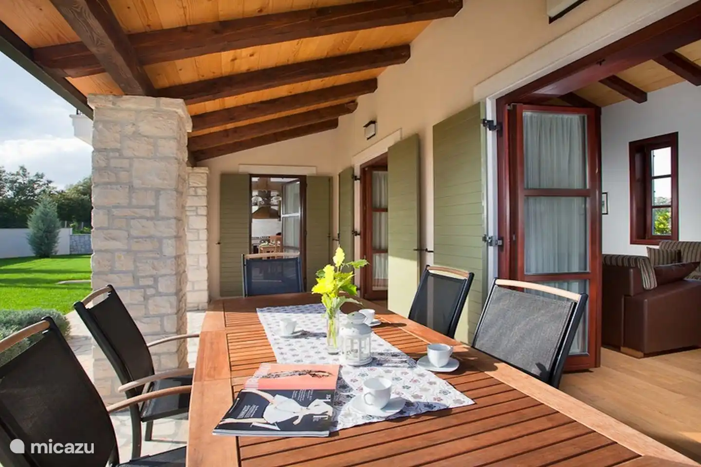 outdoor dining table under porch