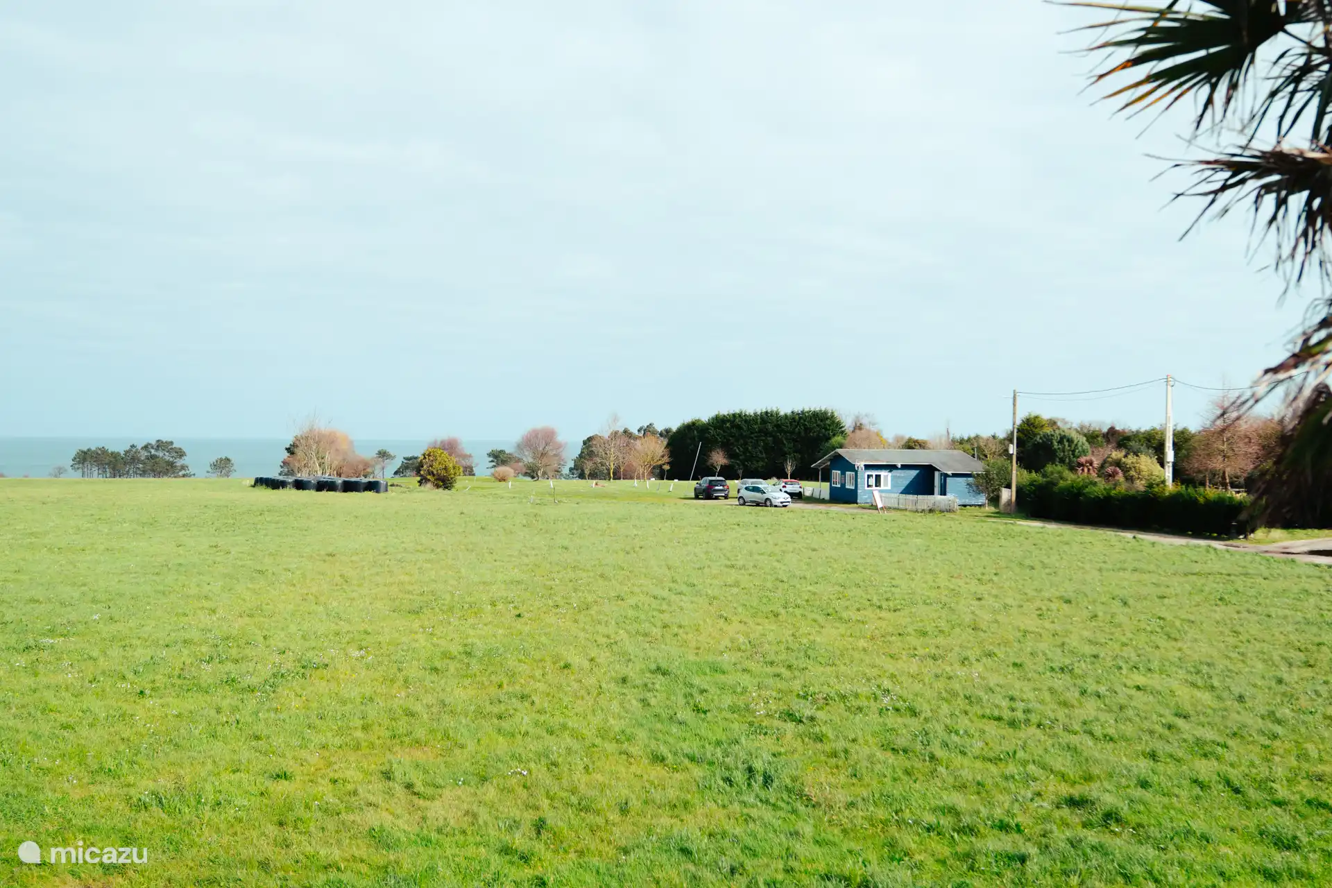Uitzicht op zee en golfbaan