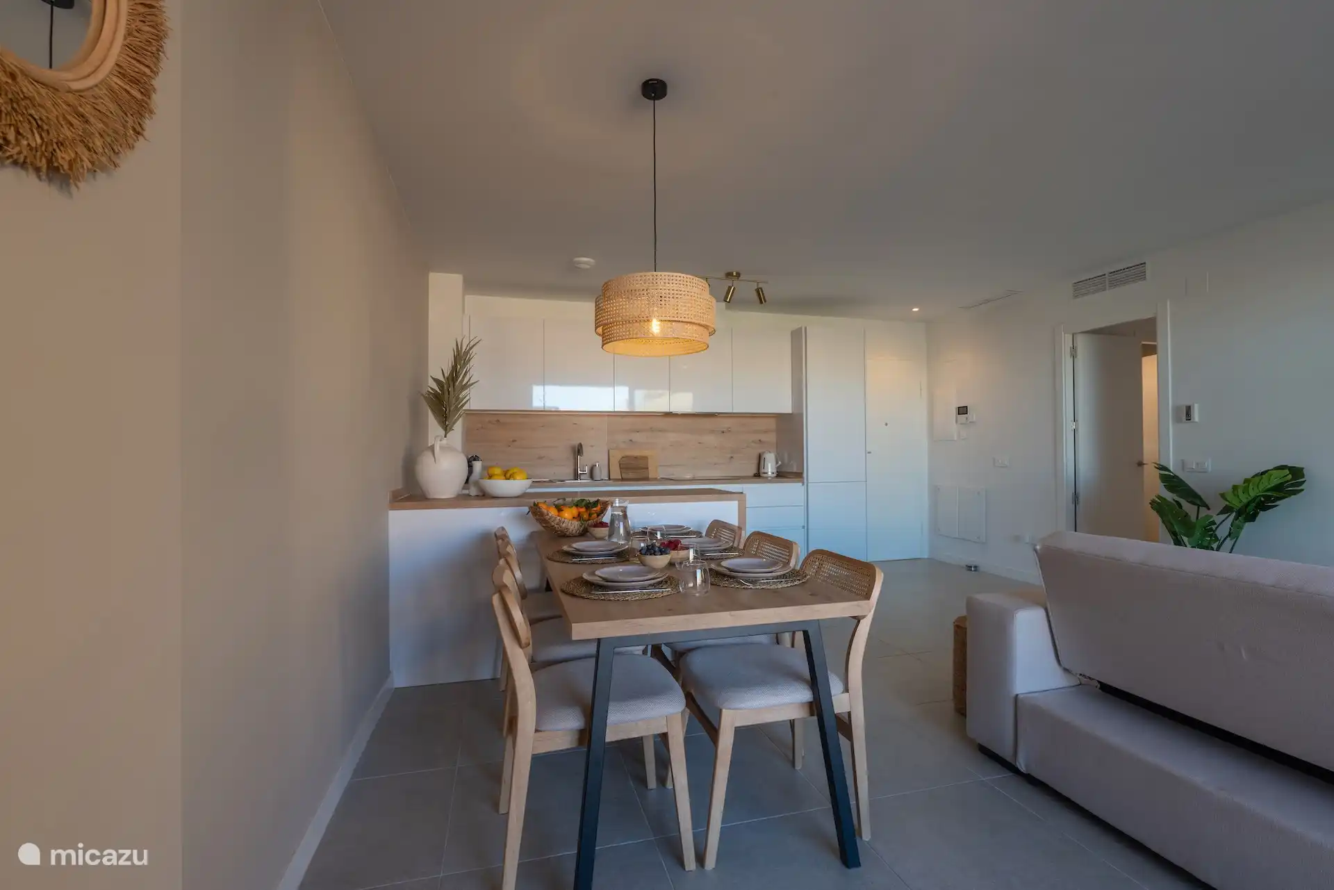 Open kitchen with all relevant appliances (including dishwasher)