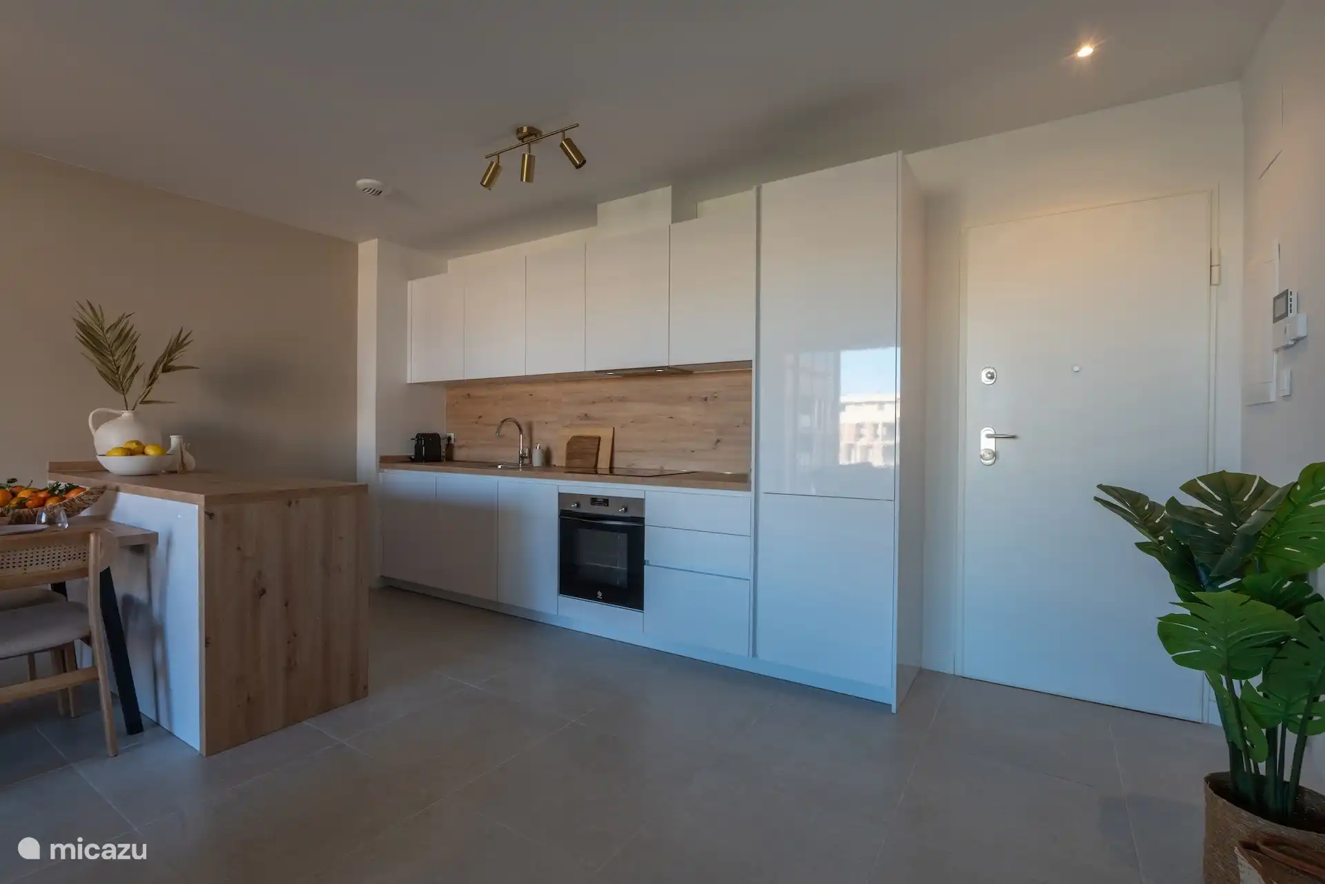 Open kitchen with detached block with plenty of cupboard space