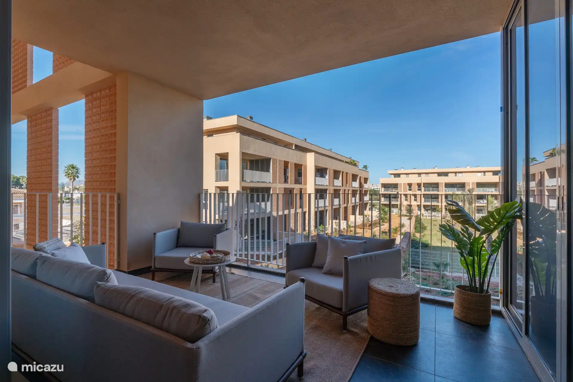 View over the complex. You can see the pool in its entirety from the balcony