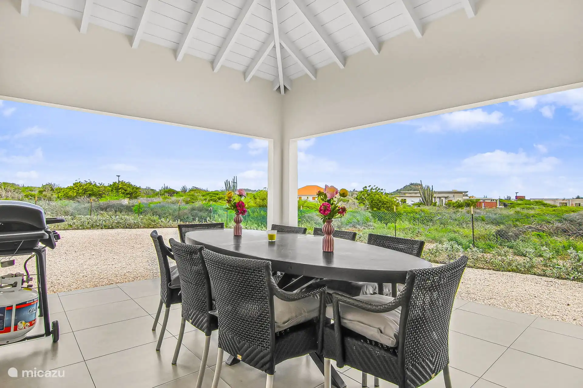 Spacious porch with a view of nature and garden