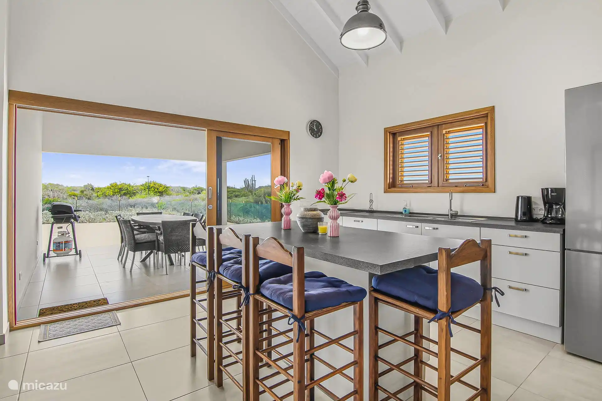 The kitchen with sliding doors to the spacious porch