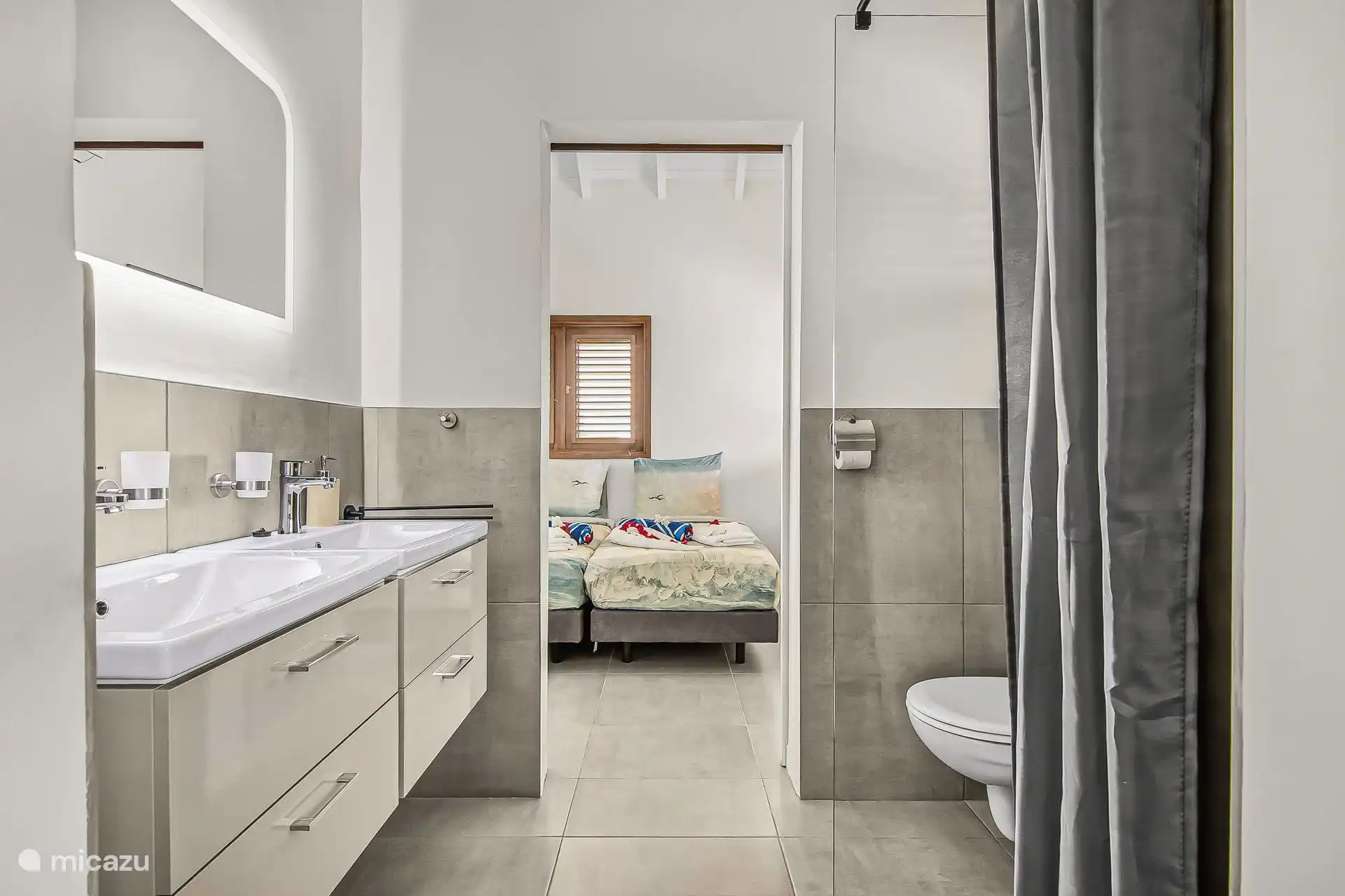 Spacious shared bathroom with the 2nd and 3rd bedrooms.